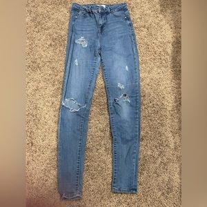 high wasted light wash ripped skinny jeans